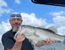 Lake Conroe Fishing Adventures Customer Holds Trophy Large Mouth Bass on Lake Conroe